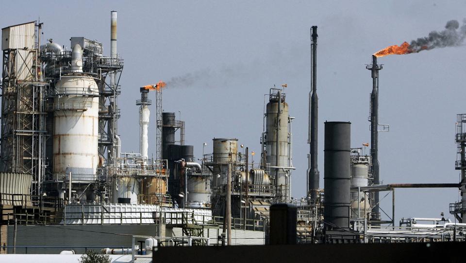 In this file photo taken in 2005 shows an oil refinery on Galveston Bay in Texas City, Texas. President Joe Biden announced Tuesday he has ordered the release of 50 million barrels of oil from the US strategic reserves in a coordinated attempt with other countries to tamp down soaring fuel prices.