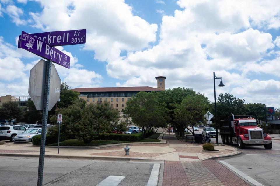 Parking lot by the Texas Christian University bookstore on west Berry street Monday, July 29, 2024. TCU plans on developing larger area along the street.