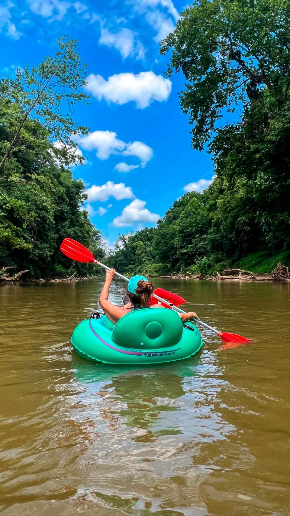 News & Observer reporter Martha Quillin floats down the Dan River near Madison. Travis Long/tlong@newsobserver.com