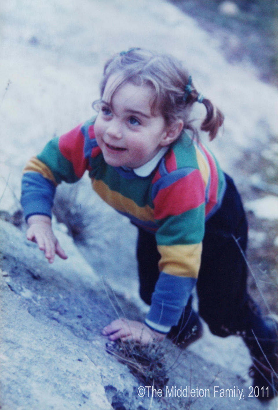 She showed an early love for exploring and activity - here aged three-and-a-half on holiday in the Lake District. We love those pigtails that mean she is ready for action. (The Middleton Family)