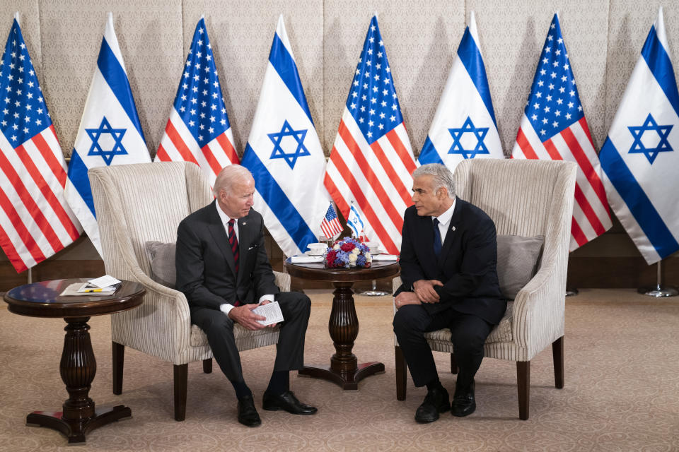 President Joe Biden and Israeli Prime Minister Yair Lapid address the media following their meeting in Jerusalem Thursday, July 14, 2022. (AP Photo/Evan Vucci)