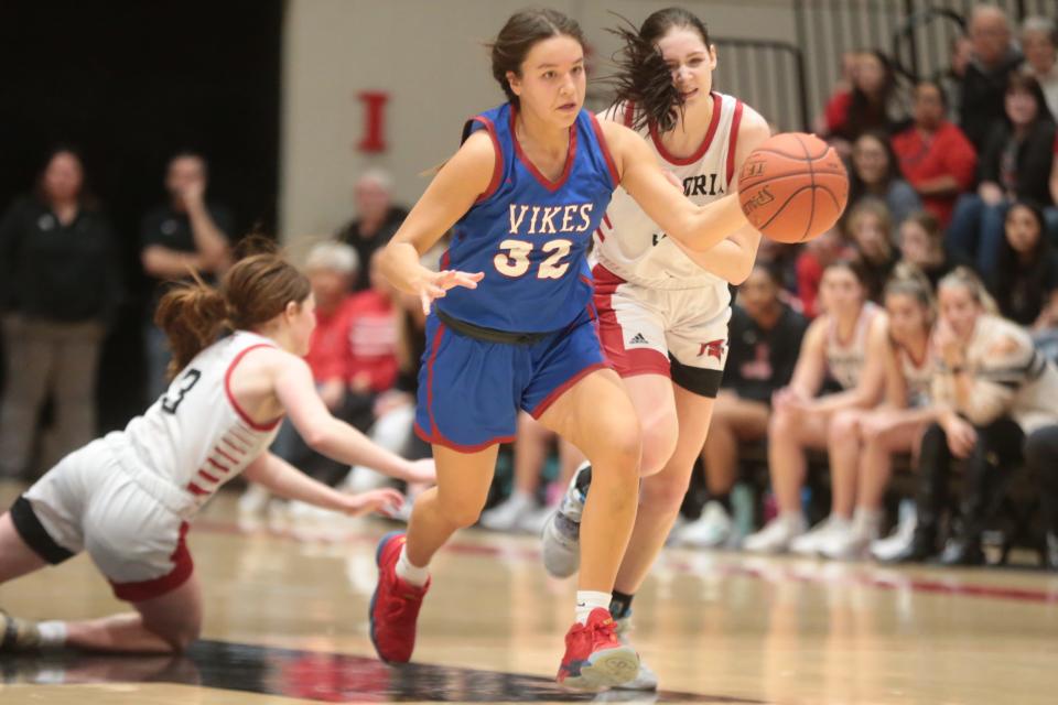Seaman freshman Maddie Gragg (32) steals the ball away from Emporia in the second half of the championship game in the Glacier's Edge Tournament at Emporia High School.