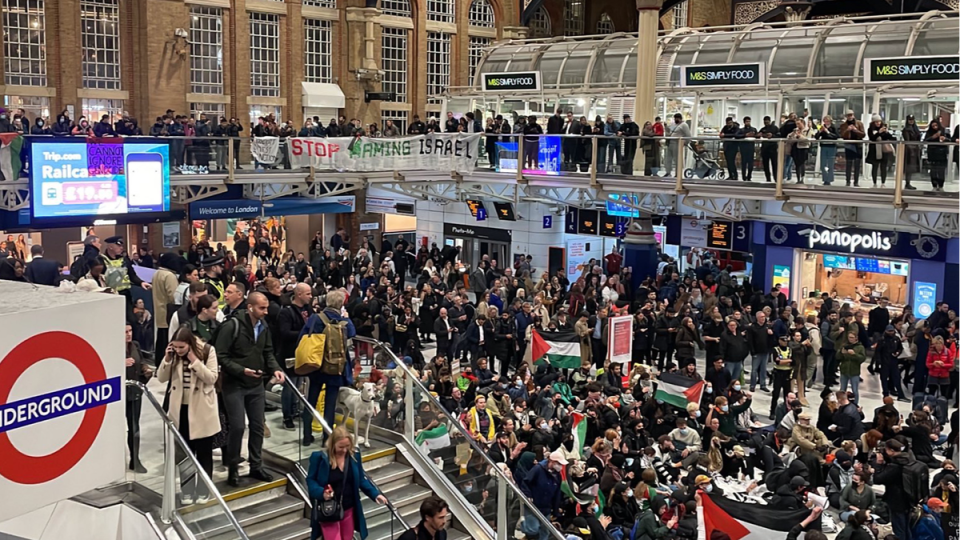 Protestors staging a sit-in at Liverpool Street station in London on Tuesday to demand an immediate ceasefire to Israel's attacks on Gaza (PA)