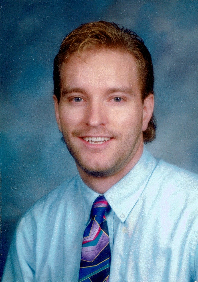 A school portrait of Rodney Wilson when he taught at the Mehlville R-IX School District in St. Louis. Wilson was a high school social studies teacher at the district from 1990-1997, In 1994, he founded LGBT History Month.