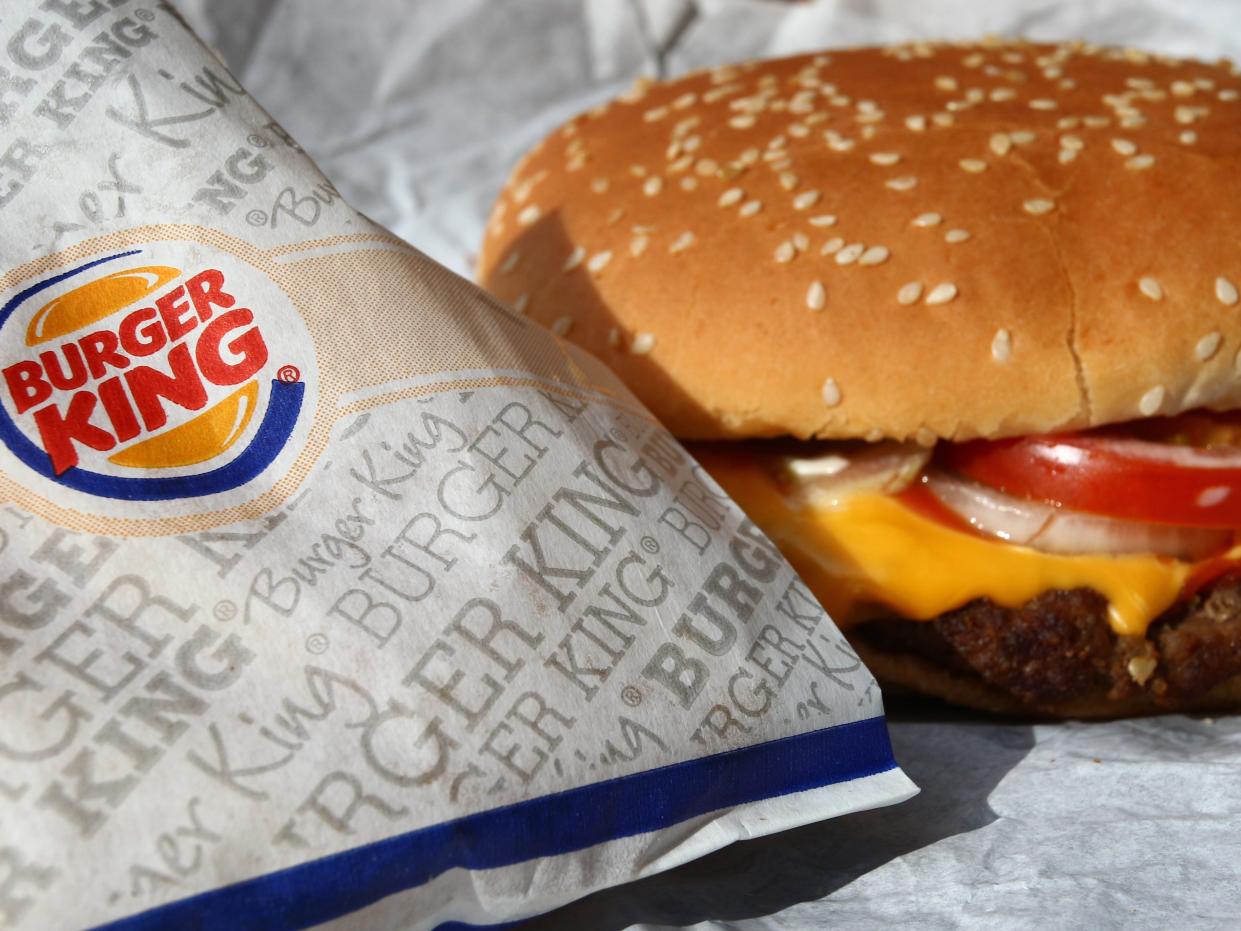 A Whopper from the fast food chain Burger King sits on a packaging paper in Kaufbeuren, Germany.