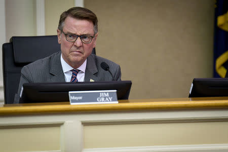 Lexington Mayor Jim Gray listens to public comment during a work session of the Lexington Fayette Urban County Counsel stand in Lexington, Kentucky, US, August 15, 2017. REUTERS/Bryan Woolston