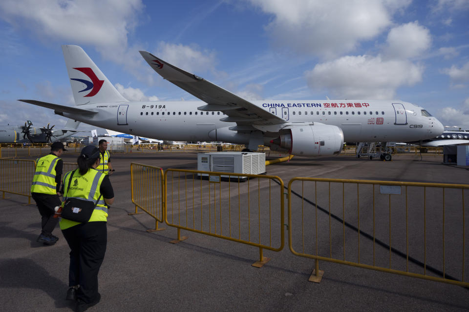 A China's COMAC C919 aircraft is on display during the first day of the Singapore Airshow in Singapore, Tuesday, Feb. 20, 2024. (AP Photo/Vincent Thian)