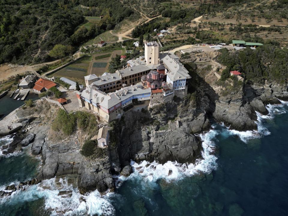 A view of Pantokrator Monastery from above in the Mount Athos, northern Greece, on Thursday, Oct. 13, 2022. Deep inside a medieval fortified monastery in the Mount Athos monastic community, researchers are for the first time tapping a virtually unknown treasure: thousands of Ottoman-era manuscripts that include the oldest of their kind in the world. (AP Photo/Thanassis Stavrakis)