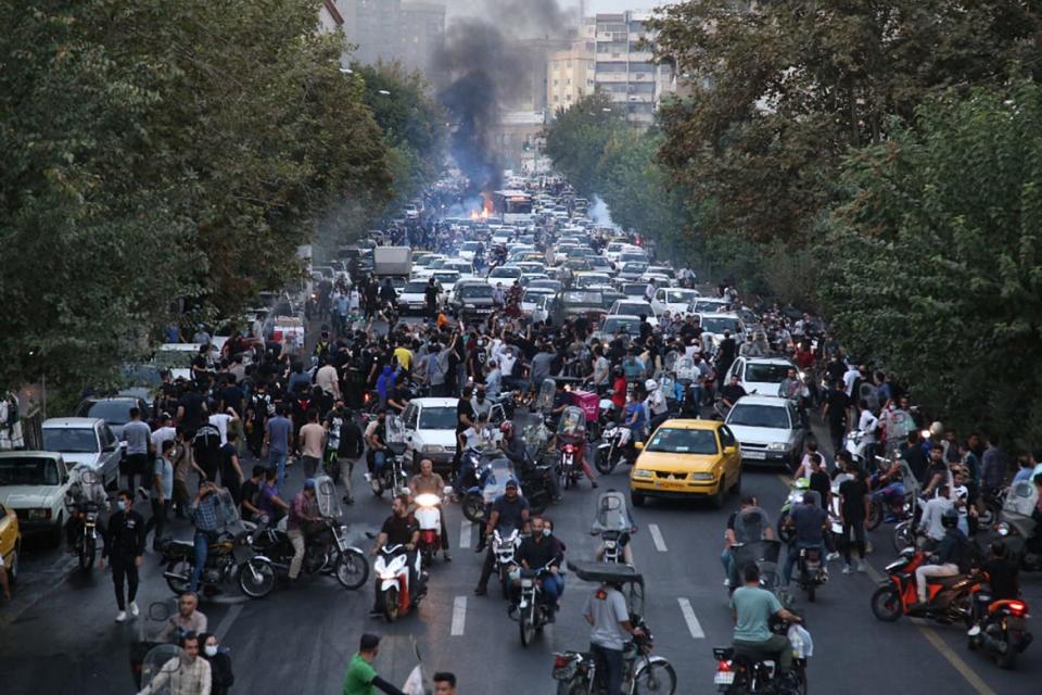 <div class="inline-image__caption"><p>Iranian demonstrators taking to the streets of the capital Tehran during a protest for Mahsa Amini, days after she died in police custody.</p></div> <div class="inline-image__credit">AFP/Getty</div>