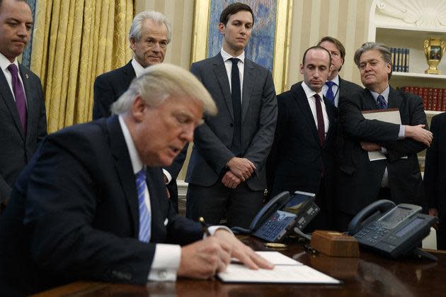 Mr Trump signed three executive orders: AP