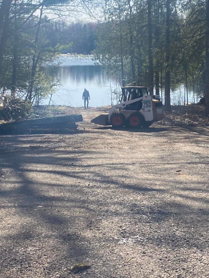 Volunteers from the Mountain area have been working to clear downed trees and open access to Green Lake as part of the re-opening activities for Green Lake Park.