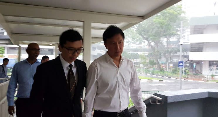 City Harvest Church founding pastor Kong Hee arrives at the State Courts to surrender himself on 21 April 2017.