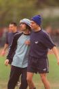 <p>Liam Gallagher of Oasis and Damon Albarn, lead singer of Blur, play in a charity soccer tournament in 1996,</p>