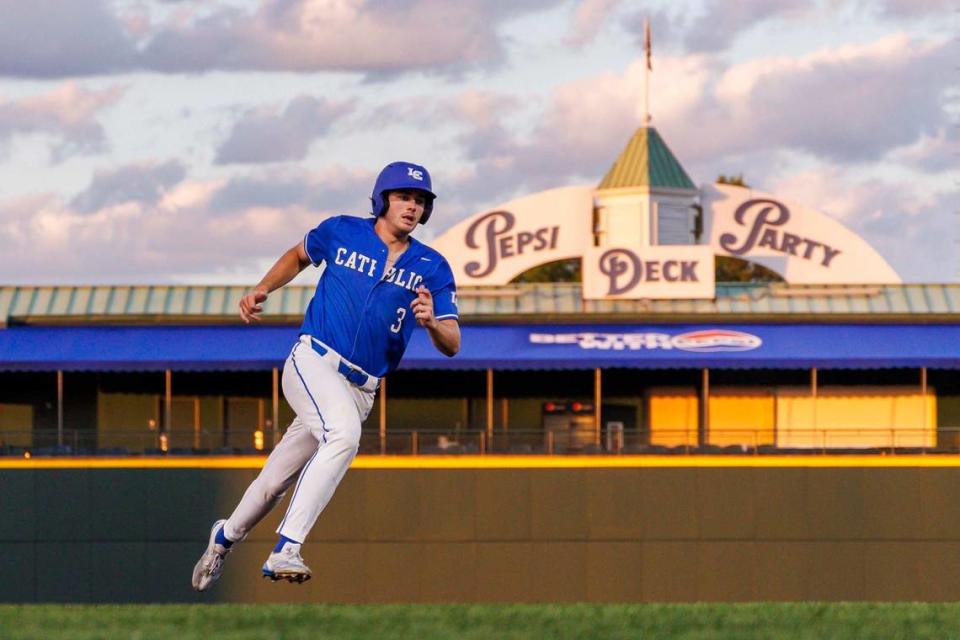 Burkley Bounds rounds third base during Lexington Catholic’s 6-0 win against Mason County on Thursday at Legends Field.