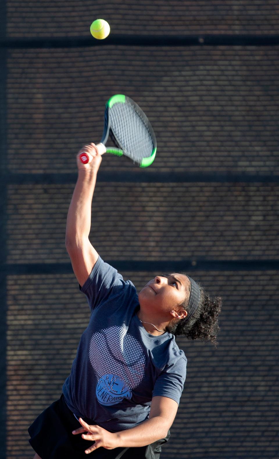 Hereford's K'Linda Mason serves the ball during her mixed doubles match against Pampa during the Region I-4A championship match, Thursday, April 14, 2022, at McLeod Tennis Center. Hereford won, 6-2, 6-2.