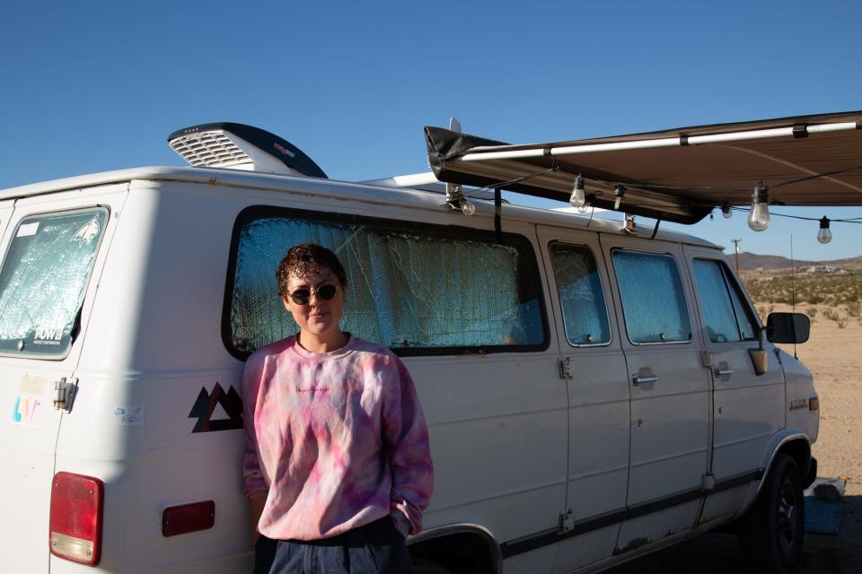 Shahira Ellaboudy outsider of her van in Joshua Tree, California.