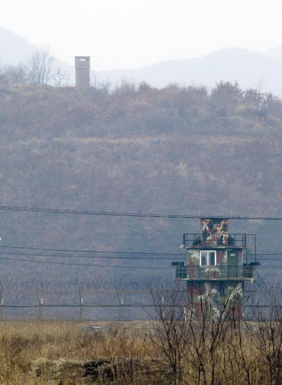 North Korean (top) and South Korean guard towers face each other across the border on March 20, 2013