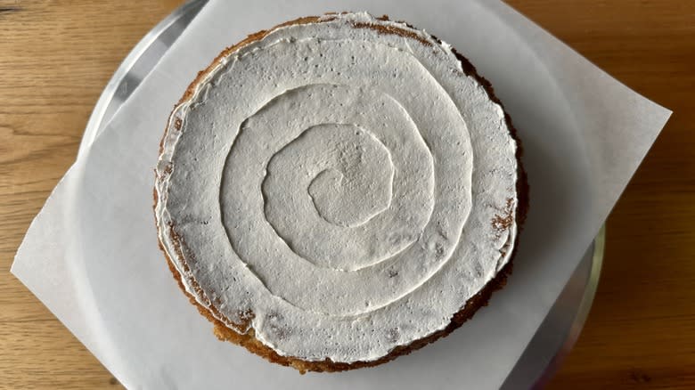 buttercream spread on vanilla cake