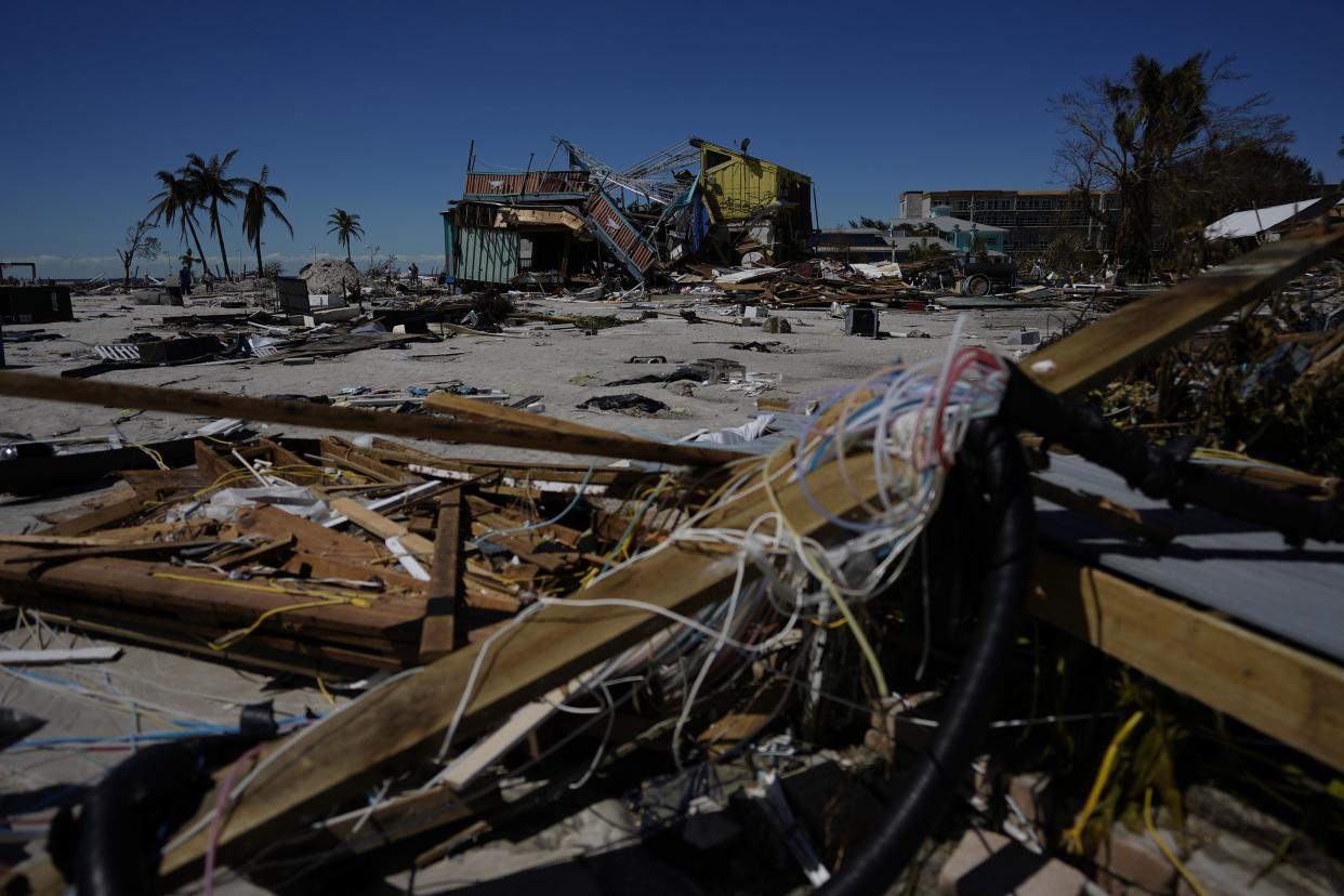 Businesses near the beach lie in ruins as others were completely swept away, two days after the passage of Hurricane Ian, in Fort Myers Beach, Fla., Friday, Sept. 30, 2022.