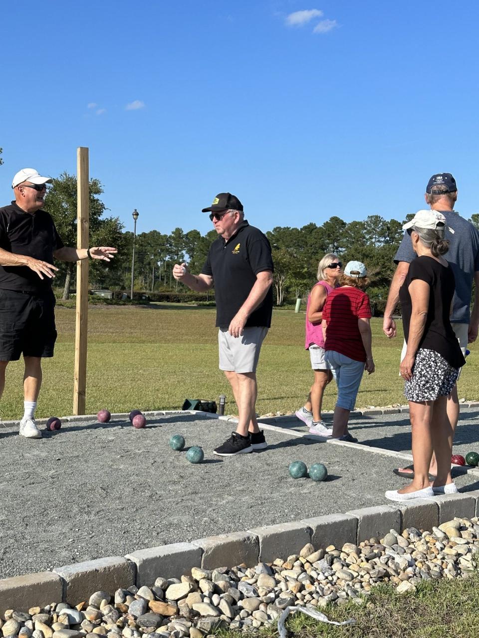 North Brunswick Newcomers Club members enjoying bocce ball on the bocce ball court at Brunswick Beer and Cider in Leland.