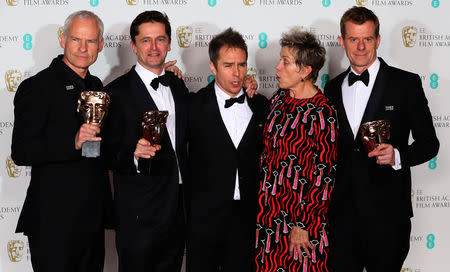 Martin McDonagh, Peter Czernin, Sam Rockwell and Graham Broadbent, pose with Frances McDormand, as they hold their trophies for Best Film for 'Three Billboards Outside Ebbing Missouri' at the British Academy of Film and Television Awards (BAFTA) at the Royal Albert Hall in London, Britain February 18, 2018. REUTERS/Hannah McKay