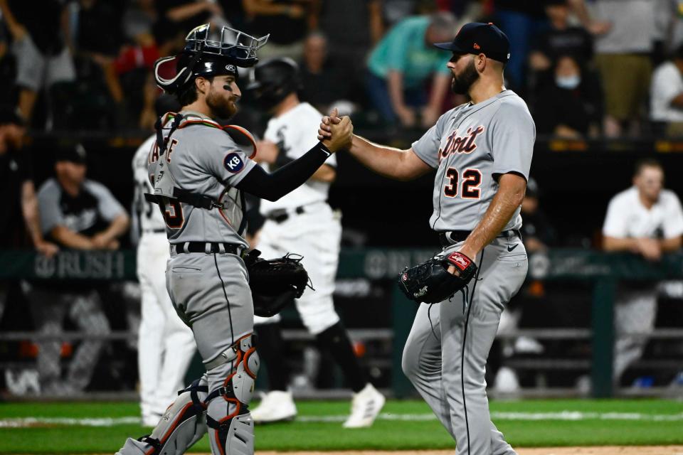 Detroit Tigers catcher Eric Haase and relief pitcher Michael Fulmer celebrate after the 7-5 win against the Chicago White Sox at Guaranteed Rate Field in Chicago, July 7, 2022.