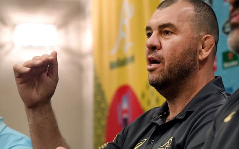 Australia's coach Michael Cheika speaks to the media during a press conference in Sapporo - Credit: Getty