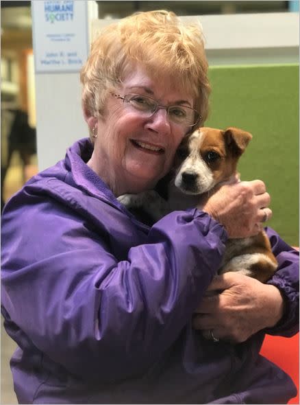 Pat Smith holds her dog, Brady. (Courtesy of Pets for the Elderly)