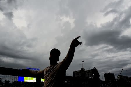 Jun 18, 2018; Chicago, IL, USA; Los Angeles Dodgers left fielder Matt Kemp (27) points while talking to fans during a rain delay before the game between the Chicago Cubs and the Los Angeles Dodgers at Wrigley Field. Mandatory Credit: Matt Marton-USA TODAY Sports