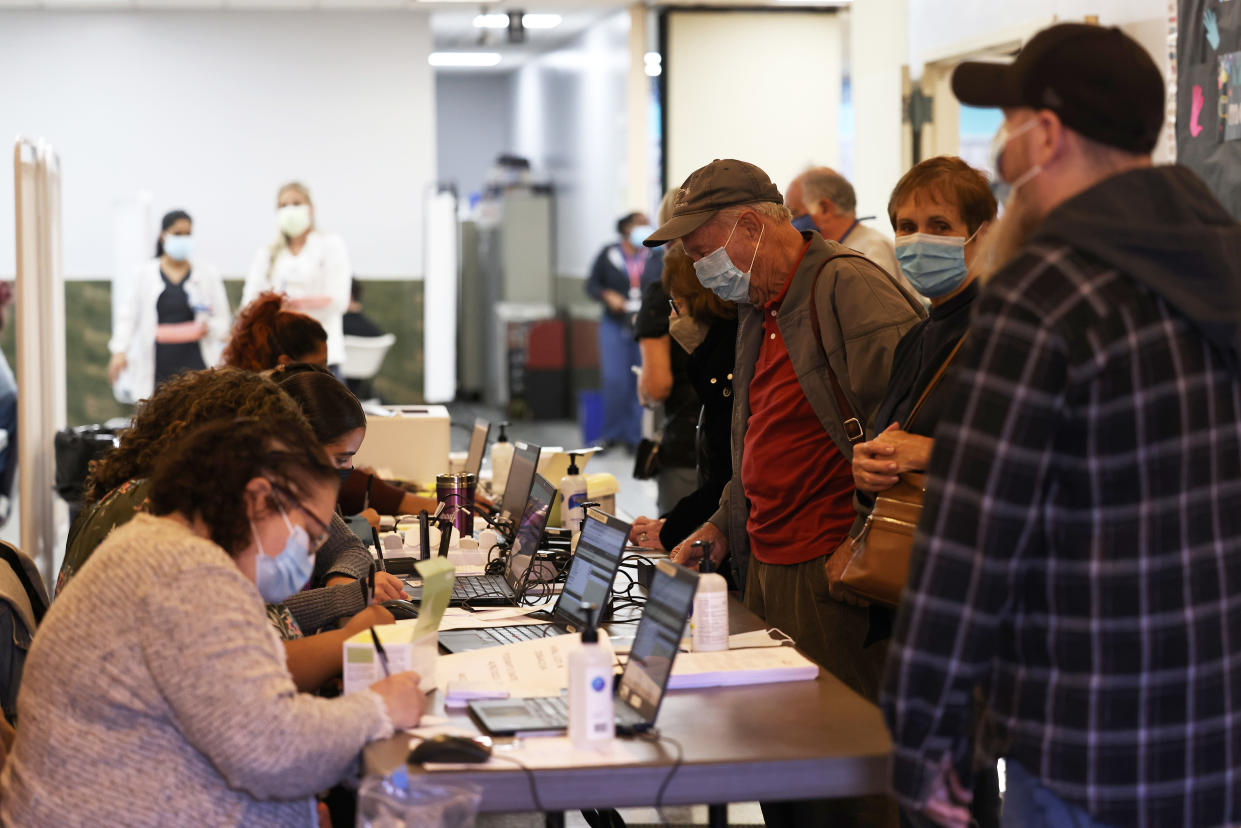 People are checked in at the Northwell Health pop-up coronavirus (COVID-19) vaccination site at the Albanian Islamic Cultural Center in Staten Island on April 08, 2021 in New York City. (Michael M. Santiago/Getty Images)