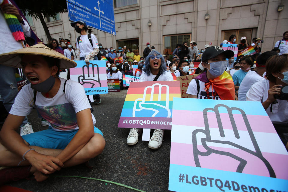 Anti-coup protesters from the LGBTQ community attend a rally in downtown Yangon, Myanmar Friday, Feb. 19, 2021. A young woman who was shot in the head by police during a protest last week against the military's takeover of power in Myanmar died Friday morning, her brother said.(AP Photo)