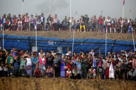 Karen people gather to watch the soldiers of Karen National Union (KNU) march during the 70th anniversary of Karen National Revolution Day in Kaw Thoo Lei, Kayin state, Myanmar January 31, 2019. REUTERS/Ann Wang