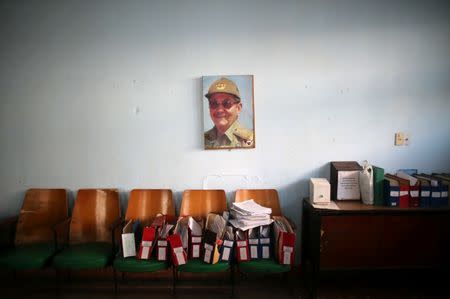 A photograph of Cuba's President Raul Castro is seen at a postal office in Holguin, Cuba, June 11, 2016. REUTERS/Alexandre Meneghini/Files