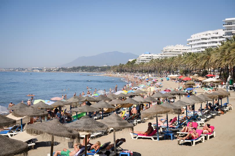 Tourists on a beach in Marbella