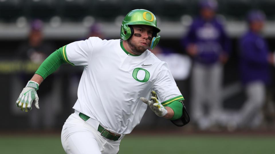 Oregon outfielder Colby Shade (26) runs to first base during an NCAA baseball game against Northwestern State on Friday, March 24, 2023, in Eugene, Ore.