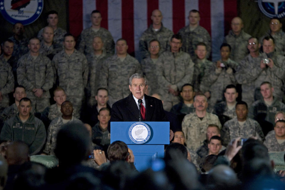 President George W. Bush addresses U.S. troops at Bagram Air Base in Afghanistan, December 2008. (Evan Vucci/AP Photo)