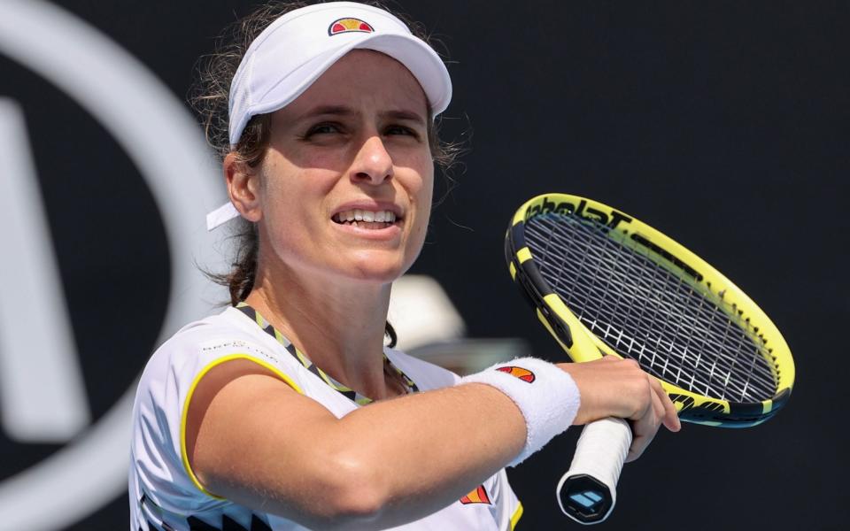 Johanna Konta reacts after a point against Tunisia's Ons Jabeur during their women's singles match on day two of the Australian Open tennis tournament in Melbourne - AFP