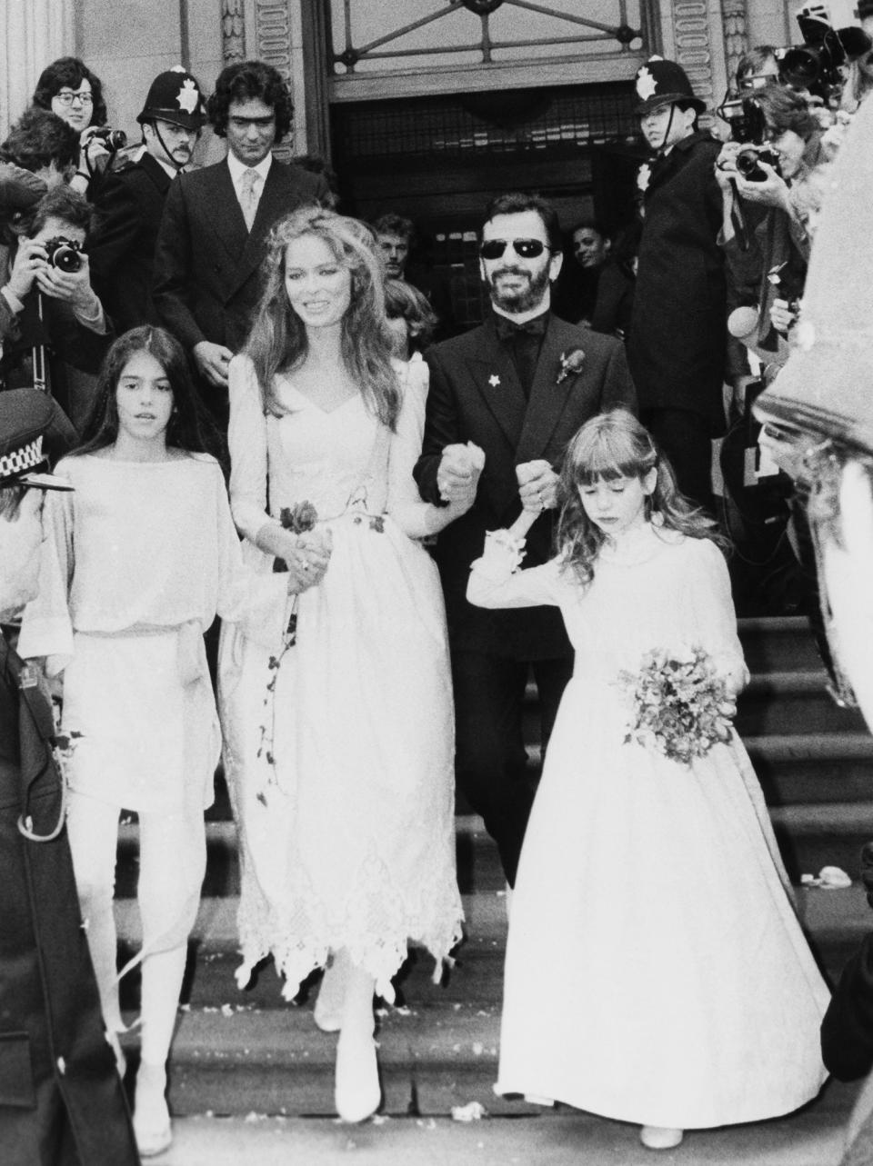 <p>The Beatle and the Bond girl were <span>married in London on April 27, 1981</span>. The reception was a mini Beatles reunion, including guests Paul McCartney and George Harrison, plus their wives and family. Tragically, John Lennon had been murdered on the streets of New York City less than five months earlier. The surviving friends had a loose jam session at Mayfair club: McCartney on piano, Harrison on guitar and Starr drumming on an upturned ice bucket with a knife and fork. Reportedly, they played the Beatles' classic "All You Need Is Love."</p>