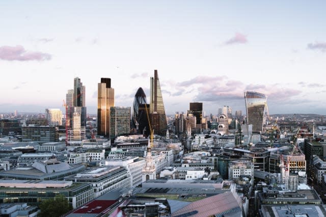 Elevated view over London City skyline at sunset