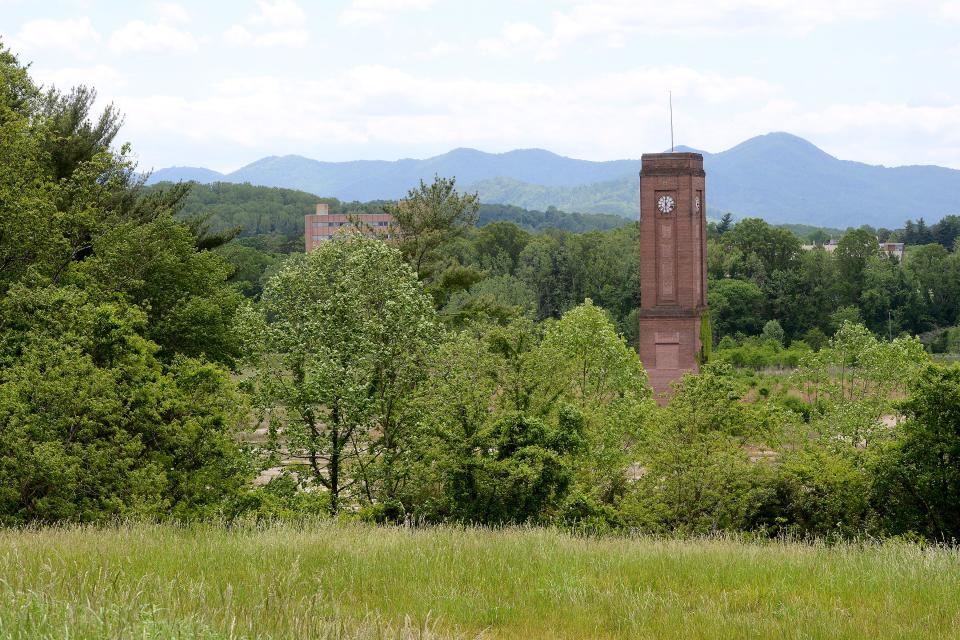 The historic clock tower in Enka will be preserved under new plans calling for three industrial buildings to go up on site.