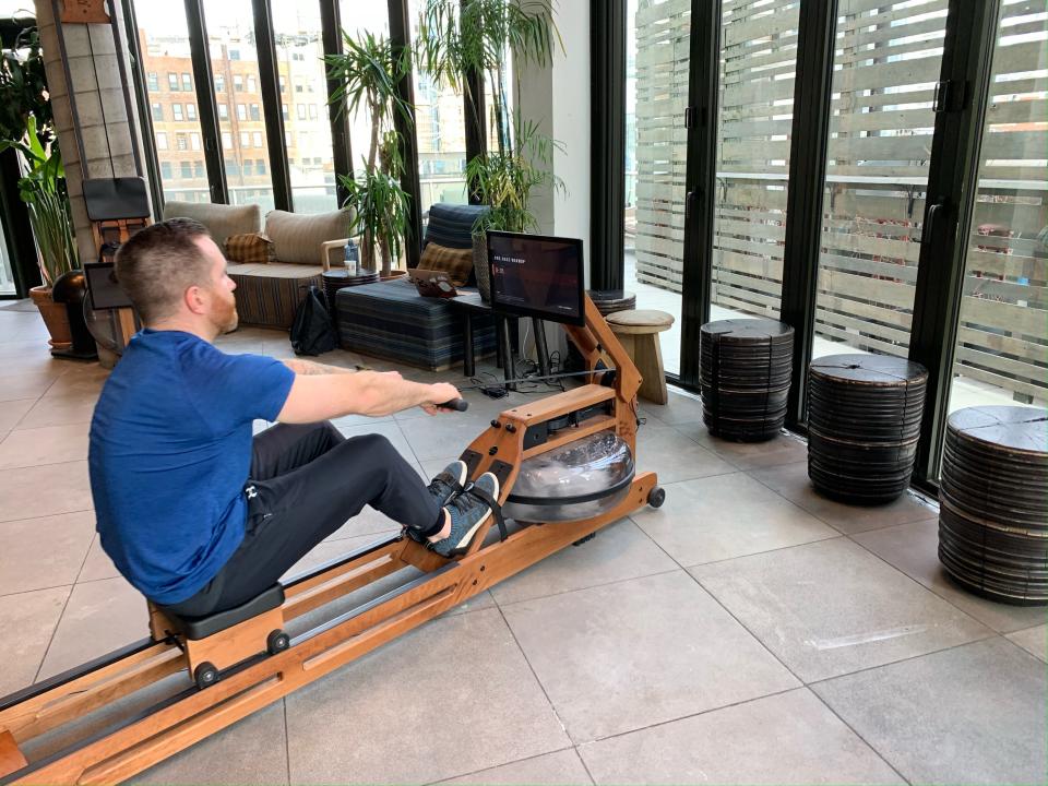 person rowing on an ergatta rowing machine -- best rowing machine 2022