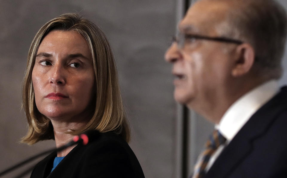 Iraqi Foreign Minister Mohamed Alhakim, right, holds a press conference with visiting European Union foreign policy chief Federica Mogherini after their meeting at the Ministry of Foreign Affairs in Baghdad, Iraq, Saturday, July 13, 2019. (AP Photo/Hadi Mizban)