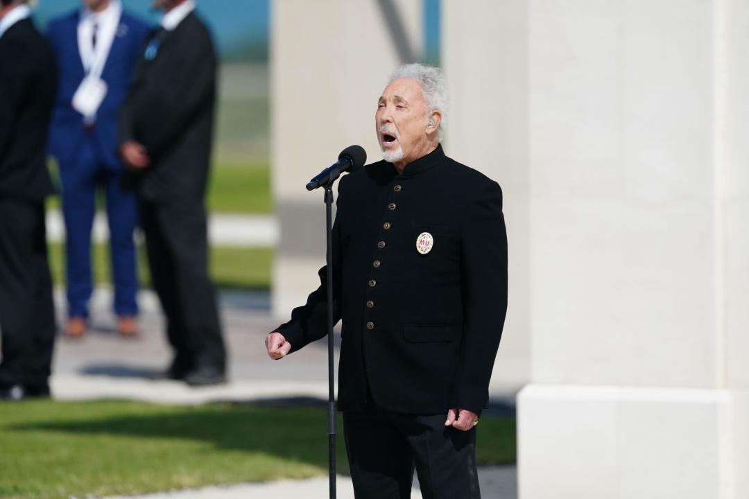 Sir Tom Jones performs during the UK national commemorative event for the 80th anniversary of D-Day, held at the British Normandy Memorial in Ver-sur-Mer, Normandy, France. Picture date: Thursday June 6, 2024.