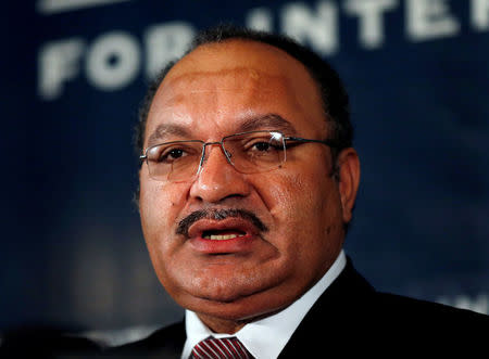 FILE PHOTO - Papua New Guinea's Prime Minister Peter O'Neill makes an address to the Lowy Institute in Sydney November 29, 2012. REUTERS/Tim Wimborne/File Photo