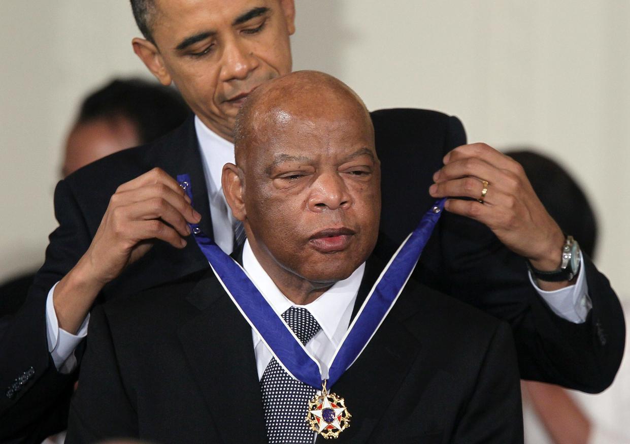 Rep. John Lewis is presented with the 2010 Medal of Freedom by President Barack Obama during an East Room event at the White House February 15, 2011, in Washington, DC.