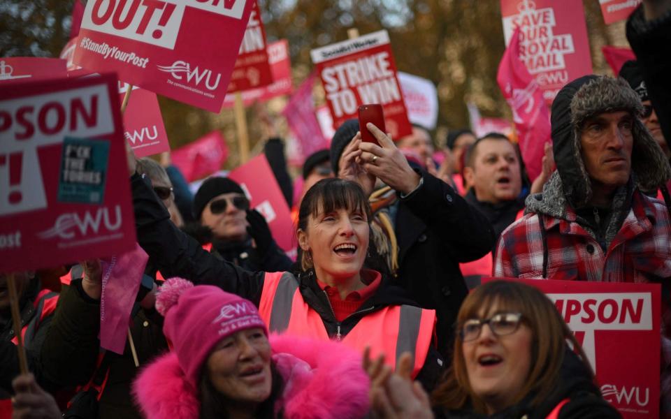 Postal workers on strike earlier this month - DANIEL LEAL/AFP via Getty Images