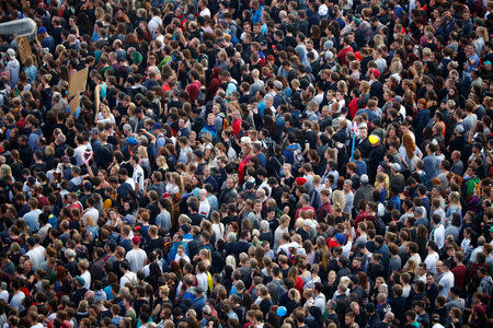 People attend an open air "anti-racism concert" in Chemnitz, Germany, September 3, 2018. REUTERS/Hannibal Hanschke