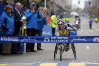 Tatyana McFadden of the United States crosses the finish line to win the women's wheelchair division of the 119th Boston Marathon in Boston, Massachusetts April 20, 2015. REUTERS/Brian Snyder