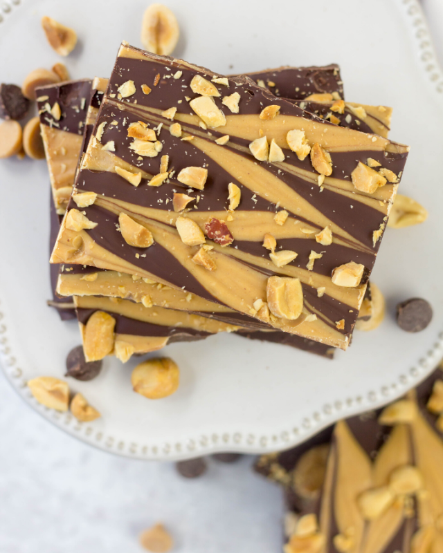 <p>Cooking with Amber</p><p>This recipe is a really quick and simple treat made with dark chocolate, peanut butter baking chips and crunchy peanuts sprinkled over the top.</p><p><strong>Get the recipe: </strong><a href="https://www.simplymaderecipes.com/peanut-butter-swirl-chocolate-bark/" rel="nofollow noopener" target="_blank" data-ylk="slk:Peanut Butter Swirl Chocolate Bark;elm:context_link;itc:0;sec:content-canvas" class="link "><strong>Peanut Butter Swirl Chocolate Bark</strong></a></p>