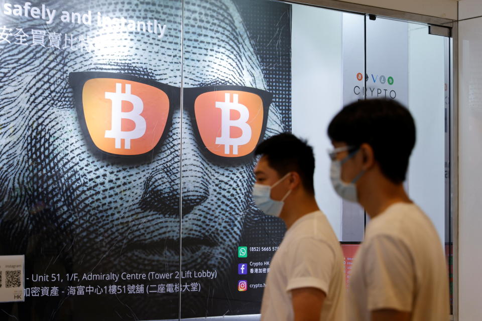 An advertisement for Bitcoin and cryptocurrencies is seen in Hong Kong, China September 27, 2021. REUTERS/Tyrone Siu